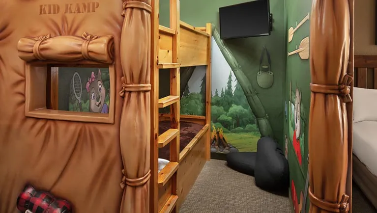 The bunk beds in the tent in the KidKamp Suite